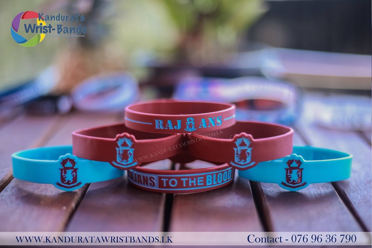 Figured silicone debossed and ink filled bracelets for Dharmaraja college, Kandy